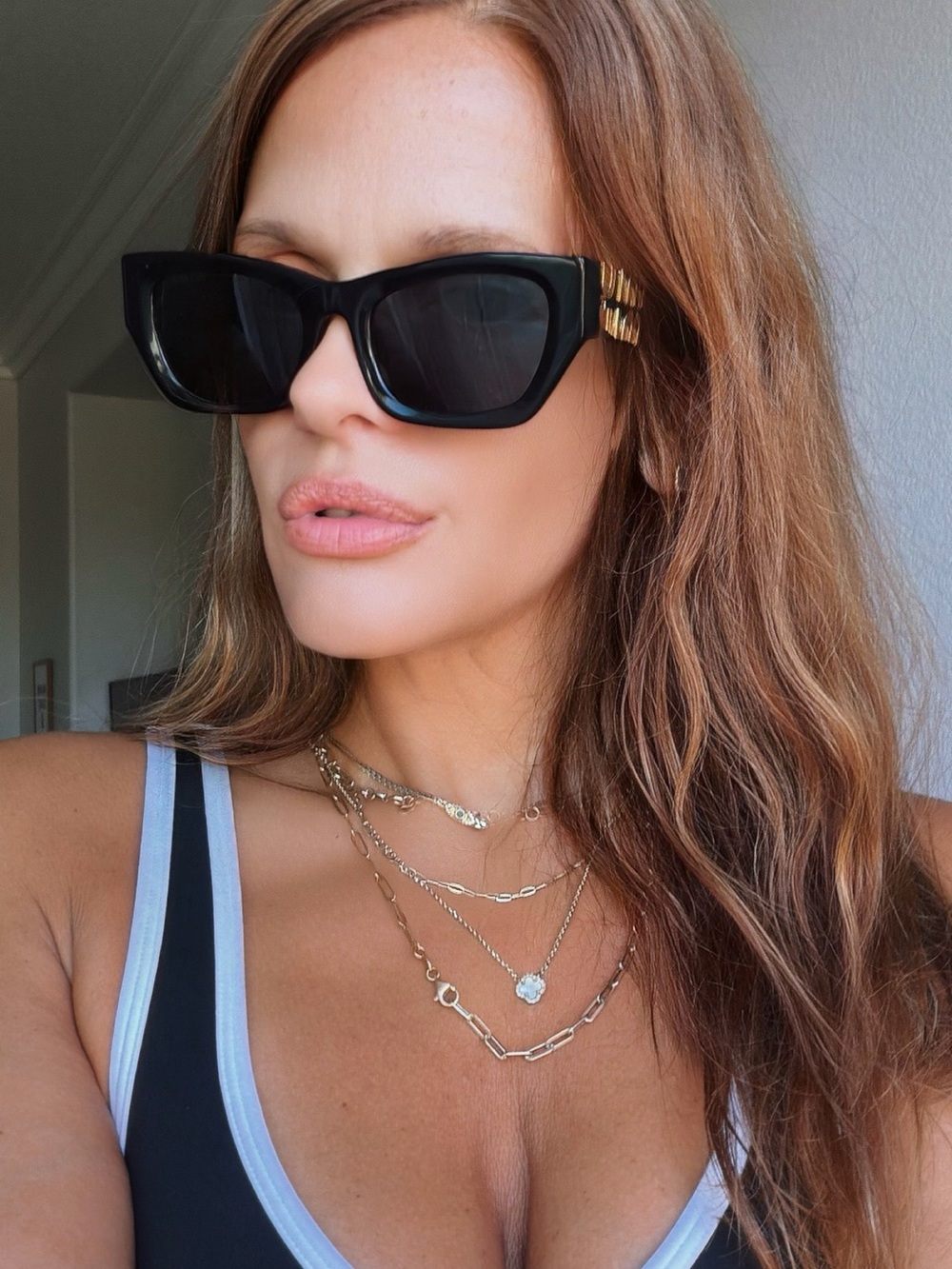 Miu Miu Black Cat-Eye Sunglasses with Dark Lenses